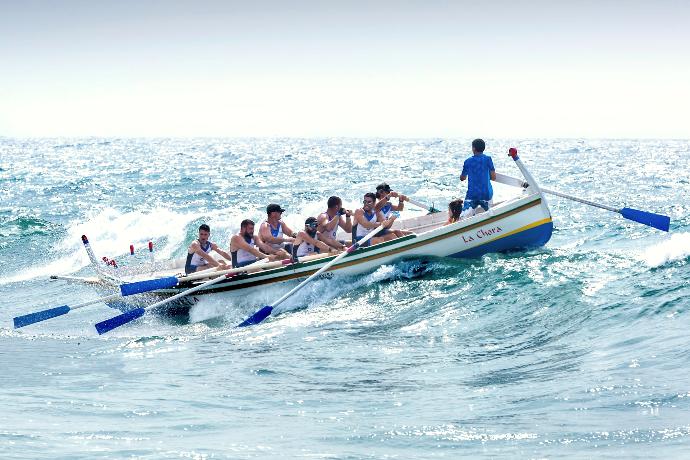 group of men riding boat